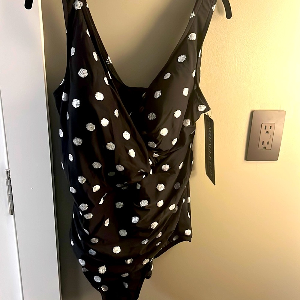 Black with silver polka dots one piece swimsuit.